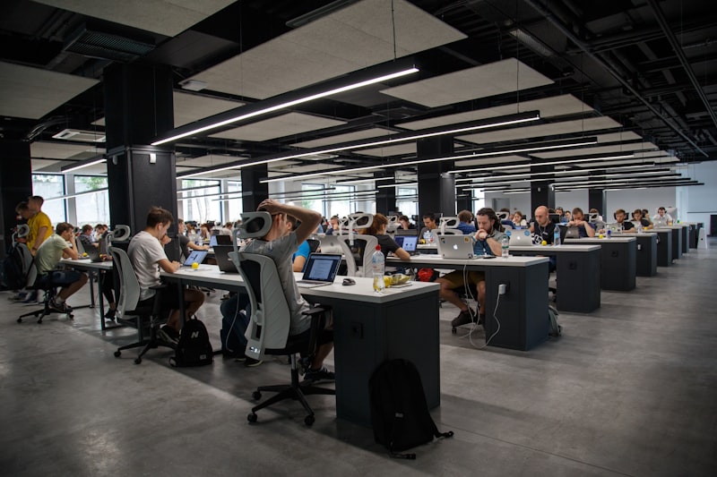 A team working together in a large open workspace